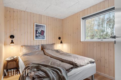 Eines der 12 Schlafzimmer im Luxusferienhaus Nr. 905
