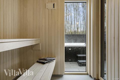 Genießen Sie die heiße Sauna im Luxusferienhaus Nr. 905 für 30 Personen