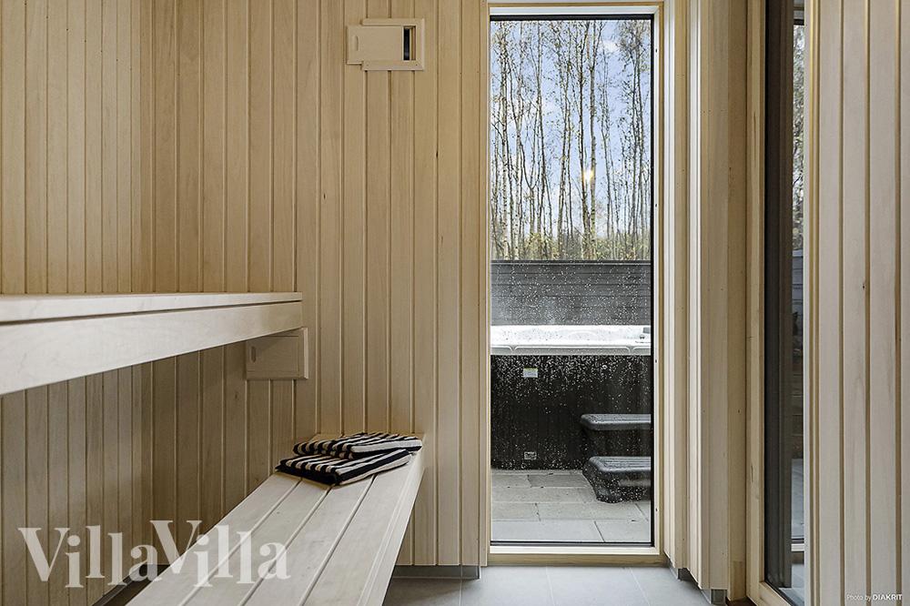Genießen Sie die heiße Sauna im Luxusferienhaus Nr. 905 für 30 Personen