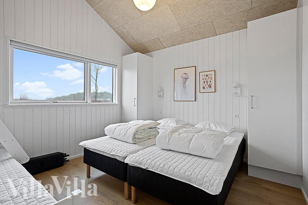 Eines der 7 Schlafzimmer im Luxusferienhaus Nr. 903