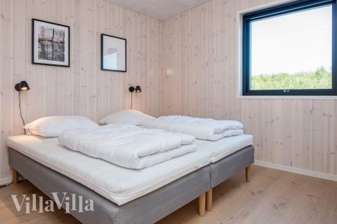 Eines der 7 Schlafzimmer im Luxusferienhaus Nr. 938