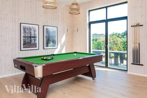 Das Luxusferienhaus 938 für 16 Personen hat einen großen Aktivitätsraum mit u. a. Billard und Darts