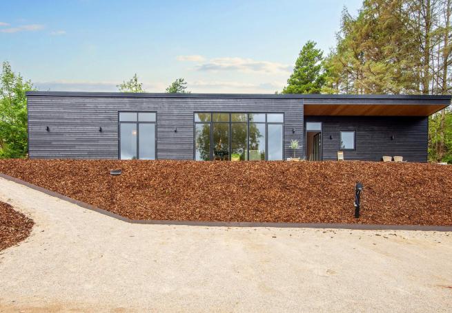 Diese schicke Haus mit Whirlpool Nr. 939 mit Platz für 16 Personen liegt in Ostjütland