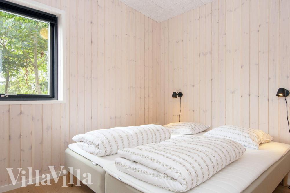 Eines der 7 Schlafzimmer im Luxusferienhaus Nr. 939