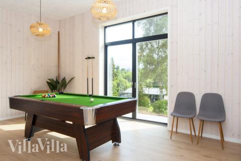 Das Luxusferienhaus 939 für 16 Personen hat einen großen Aktivitätsraum mit u. a. Billard und Darts