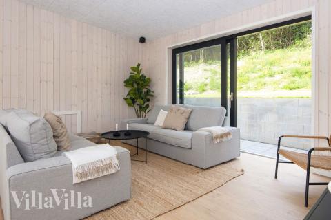 Die Couchecke im Luxusferienhaus Nr. 939 in Ostjütland.