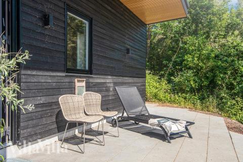 Auf der Terrasse des Ferienhauses Nr. 939 ist Platz für 16 Personen.