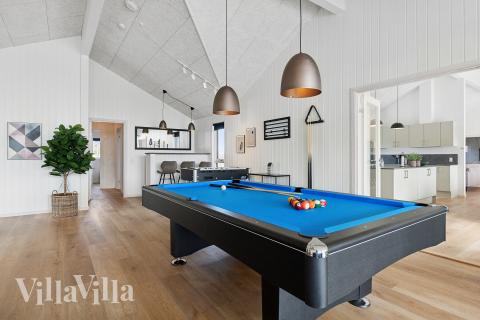 Neben den vielen schönen Stunden, die man im Poolbereich des Hauses verbringen kann, bietet das Luxusferienhaus 923 auch Spielevergnügen bei Billard/Tischtennis und Darts