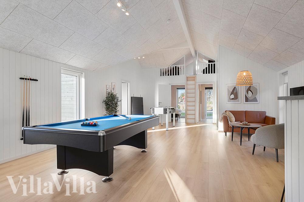 Neben den vielen schönen Stunden, die man im Poolbereich des Hauses verbringen kann, bietet das Luxusferienhaus 808 auch Spielevergnügen bei Billard/Tischtennis und Darts