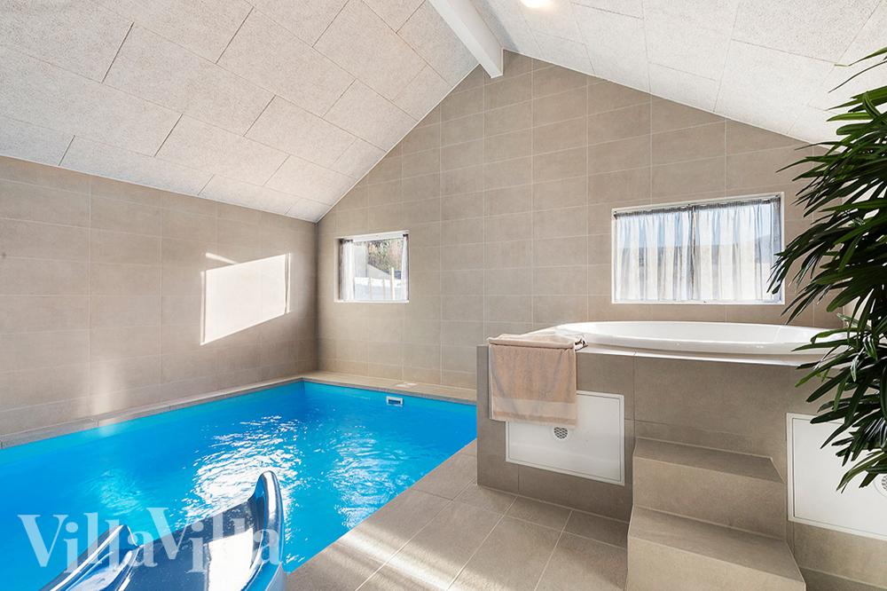 Genießen Sie den warmen Whirlpool im Luxusferienhaus Nr. 808 in Ostjütland