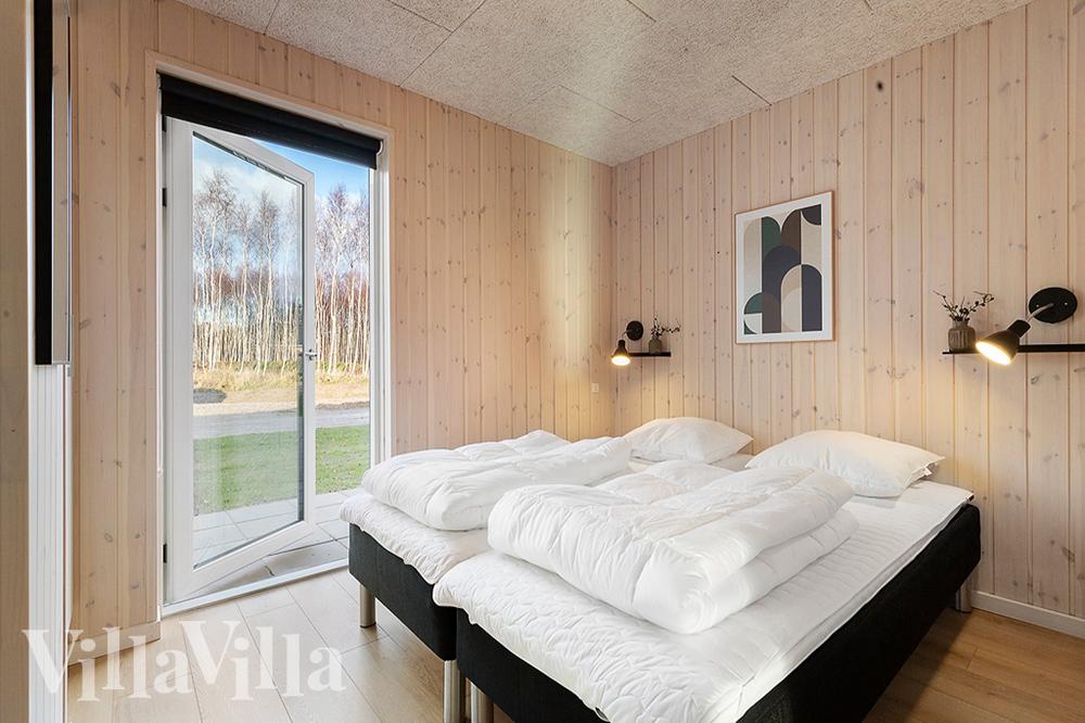 Eines der 8 Schlafzimmer im Luxusferienhaus Nr. 808