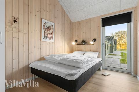 Eines der 12 Schlafzimmer im Luxusferienhaus Nr. 806