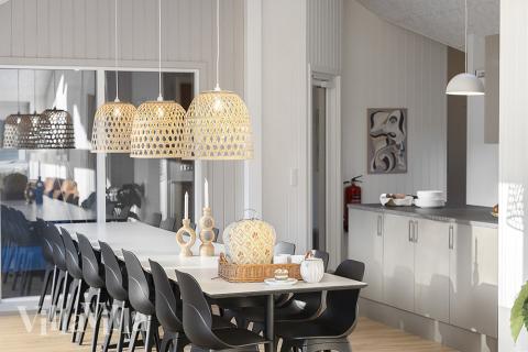 Der große, lichtdurchflutete Aufenthaltsraum im Luxusferienhaus Nr. 802 für 16.