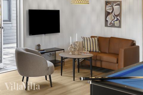 Das Luxusferienhaus 802 für 16 Personen hat einen großen Aktivitätsraum mit u. a. Billard und Darts