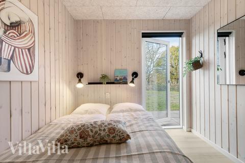 Eines der 6 Schlafzimmer im Luxusferienhaus Nr. 802