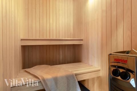 Genießen Sie die heiße Sauna im Luxusferienhaus Nr. 802 für 16 Personen