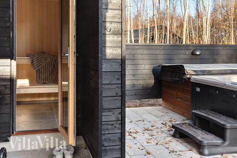 Genießen Sie einen Grillabend auf der Terrasse des Luxusferienhauses Nr. 911 in Lolland/Falster/Mön