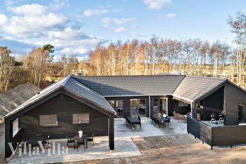 Dieses schöne Poolhaus Nr. 911 mit Platz für 20 Personen liegt in Lolland/Falster/Mön