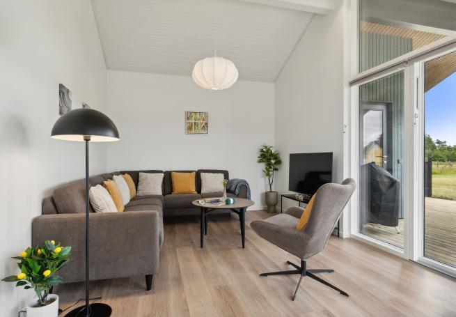 Die Couchecke im Luxusferienhaus Nr. 927 in Bornholm.