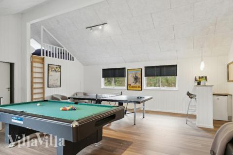 Neben den vielen schönen Stunden, die man im Poolbereich des Hauses verbringen kann, bietet das Luxusferienhaus 351 auch Spielevergnügen bei Billard/Tischtennis und Darts