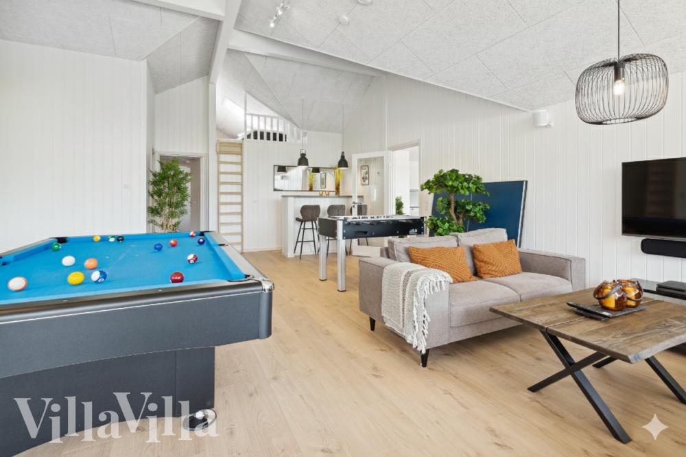 Neben den vielen schönen Stunden, die man im Poolbereich des Hauses verbringen kann, bietet das Luxusferienhaus 598 auch Spielevergnügen bei Billard/Tischtennis und Darts