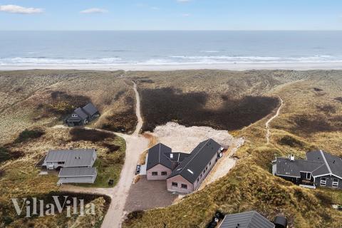 Dieses schöne Poolhaus Nr. 900 mit Platz für 18 Personen liegt in Westjütland