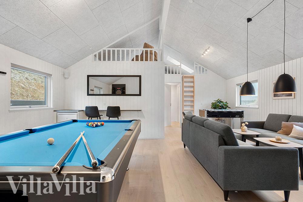 Neben den vielen schönen Stunden, die man im Poolbereich des Hauses verbringen kann, bietet das Luxusferienhaus 900 auch Spielevergnügen bei Billard/Tischtennis und Darts