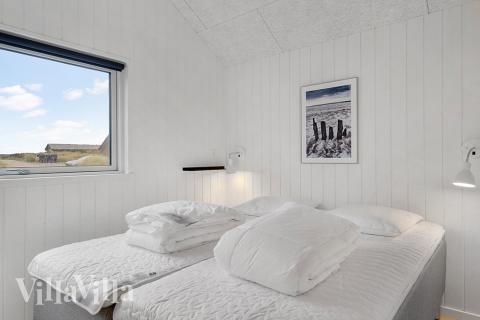 Eines der 7 Schlafzimmer im Luxusferienhaus Nr. 900