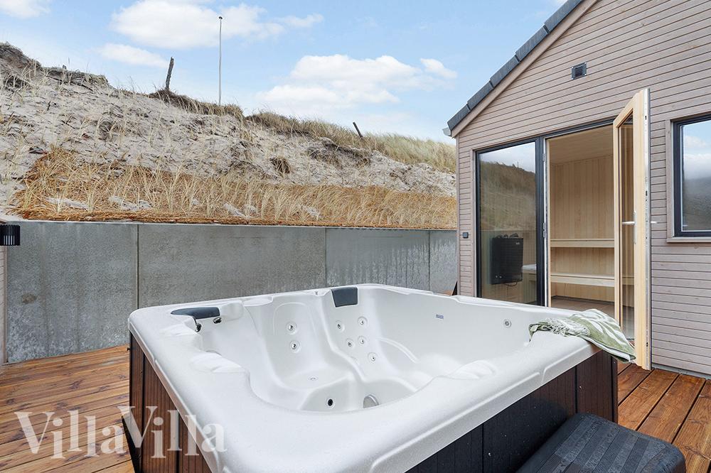 Das Luxusferienhaus Nr. 900 bietet u. a. einen tollen Whirlpool