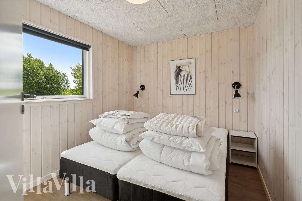 Eines der 7 Schlafzimmer im Luxusferienhaus Nr. 921