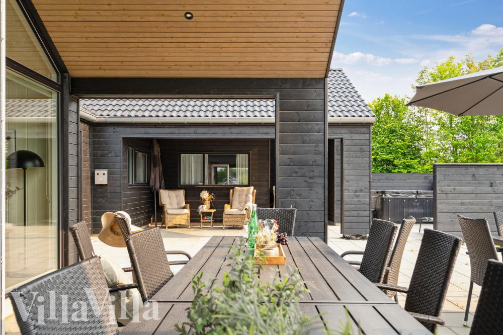 Genießen Sie einen Grillabend auf der Terrasse des Luxusferienhauses Nr. 921 in Fünen und seine Inseln