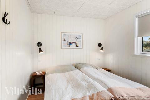 Eines der 12 Schlafzimmer im Luxusferienhaus Nr. 910