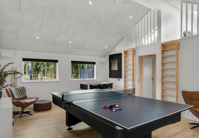 Neben den vielen schönen Stunden, die man im Poolbereich des Hauses verbringen kann, bietet das Luxusferienhaus 922 auch Spielevergnügen bei Billard/Tischtennis und Darts