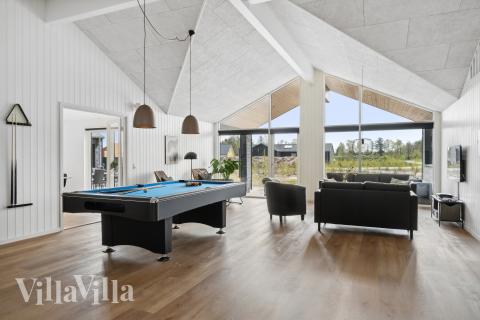 Das Luxusferienhaus 914 für 30 Personen hat einen großen Aktivitätsraum mit u. a. Billard und Darts