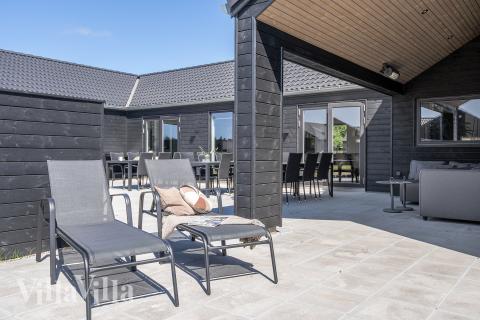 Das Luxusferienhaus Nr. 914 hat eine tolle Terrasse, die mit hochwertigen Gartenmöbeln für 30 Personen ausgestattet ist.