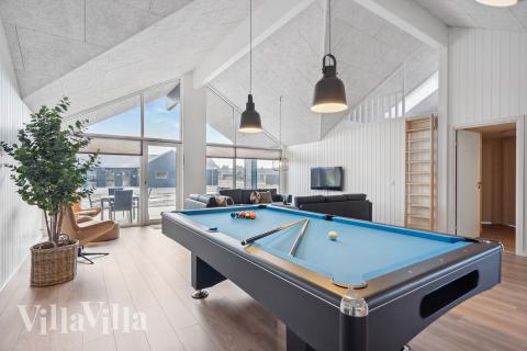 Neben den vielen schönen Stunden, die man im Poolbereich des Hauses verbringen kann, bietet das Luxusferienhaus 917 auch Spielevergnügen bei Billard/Tischtennis und Darts