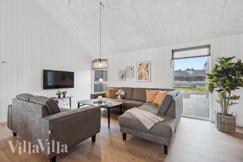 Die Couchecke im Luxusferienhaus Nr. 917 in Fünen und seine Inseln.