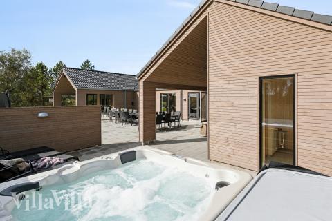 Genießen Sie den warmen Whirlpool im Luxusferienhaus Nr. 934 in Lolland/Falster/Mön