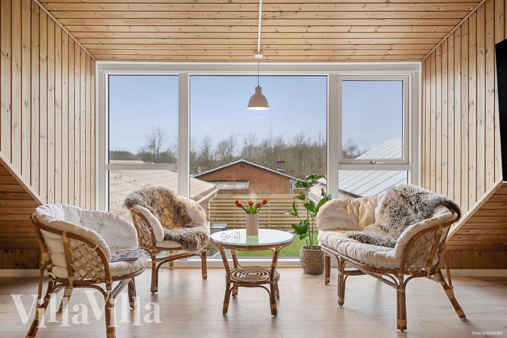 Aufenthaltsraum mit Platz für 26 im Luxusferienhaus Nr. 688.