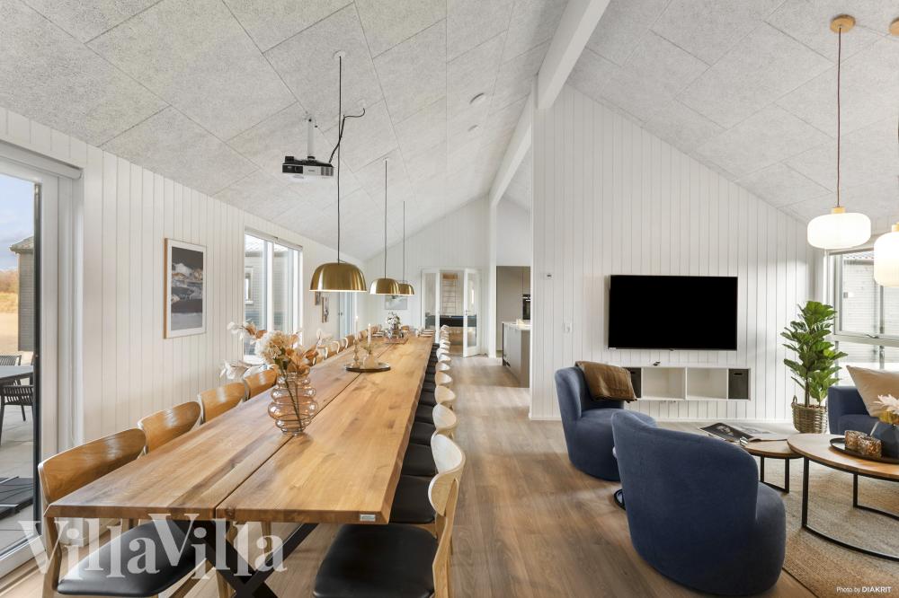 Der Aufenthaltsraum bietet Platz für 30 Personen, wenn ihr das Ferienhaus 910 in Lolland/Falster/Mön besucht.