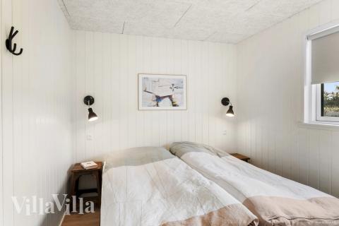 Eines der 12 Schlafzimmer im Luxusferienhaus Nr. 910