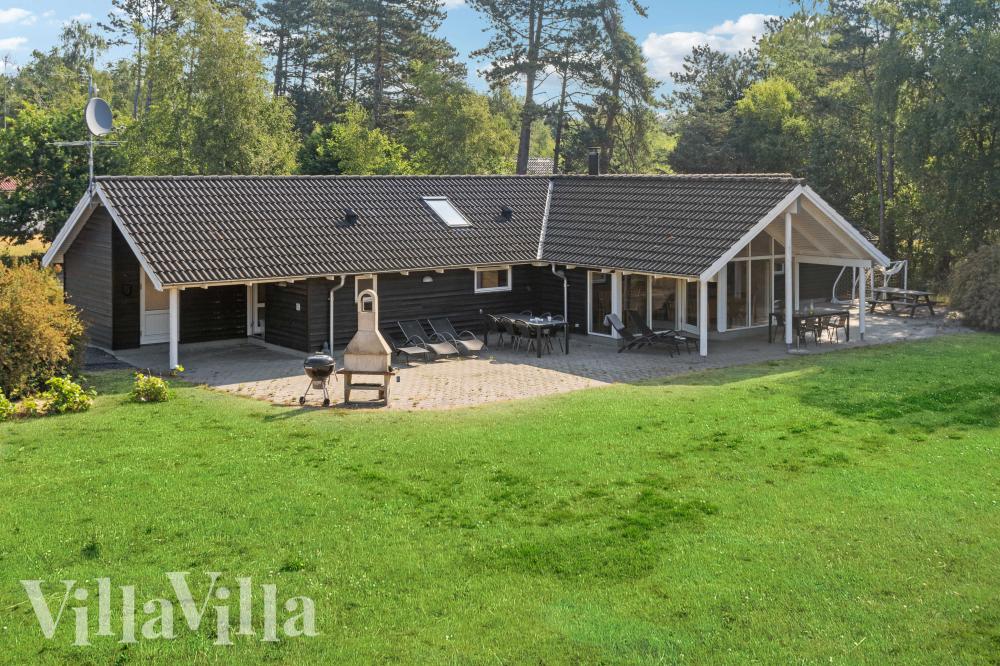 Diese schicke Haus mit Whirlpool Nr. 159 mit Platz für 12 Personen liegt in Lolland/Falster/Mön