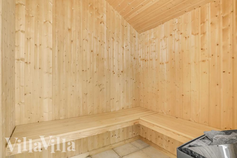 Genießen Sie die heiße Sauna im Luxusferienhaus Nr. 159 für 12 Personen