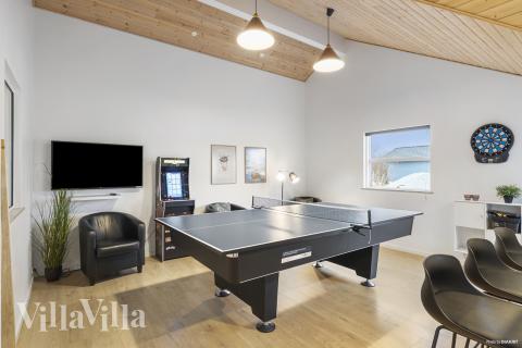 Neben den vielen schönen Stunden, die man im Poolbereich des Hauses verbringen kann, bietet das Luxusferienhaus 196 auch Spielevergnügen bei Billard/Tischtennis und Darts