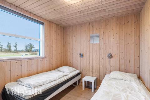 Eines der 9 Schlafzimmer im Luxusferienhaus Nr. 196