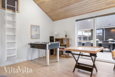 Das Luxusferienhaus 196 für 22 Personen hat einen großen Aktivitätsraum mit u. a. Billard und Darts