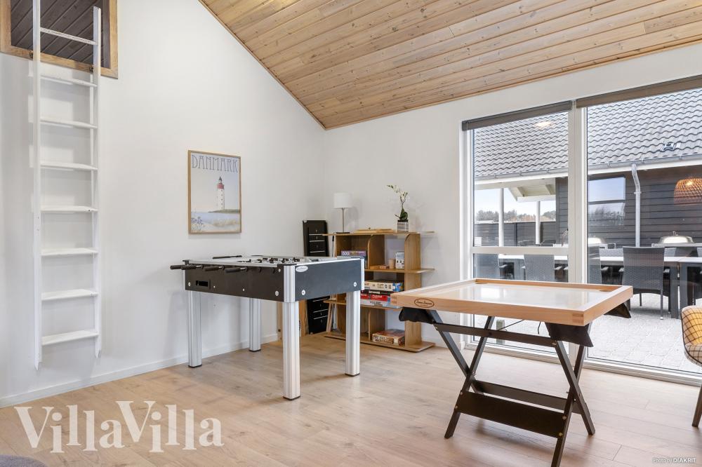 Das Luxusferienhaus 196 für 22 Personen hat einen großen Aktivitätsraum mit u. a. Billard und Darts