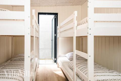 Eines der 7 Schlafzimmer im Luxusferienhaus Nr. 941