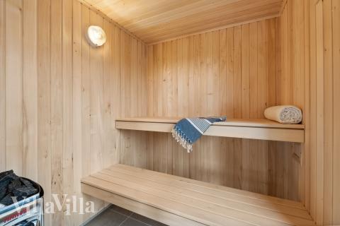 Genießen Sie die heiße Sauna im Luxusferienhaus Nr. 943 für 18 Personen