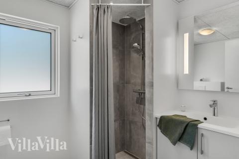 Eines der Badezimmer im Luxusferienhaus Nr. 929